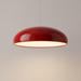 Red dome pendant light above a dining table — statement pendant light in a neutral room
